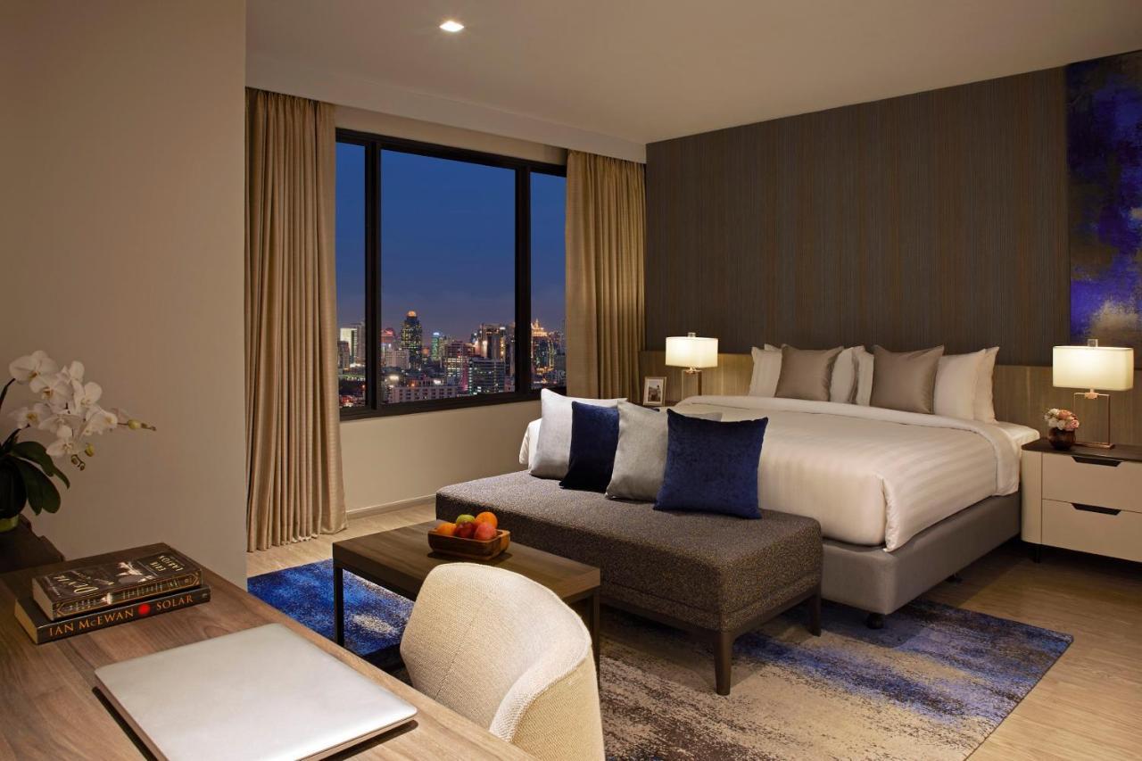 Somerset Rama 9 Bangkok - SHA Plus Certified Bagian luar foto A bedroom at the hotel
