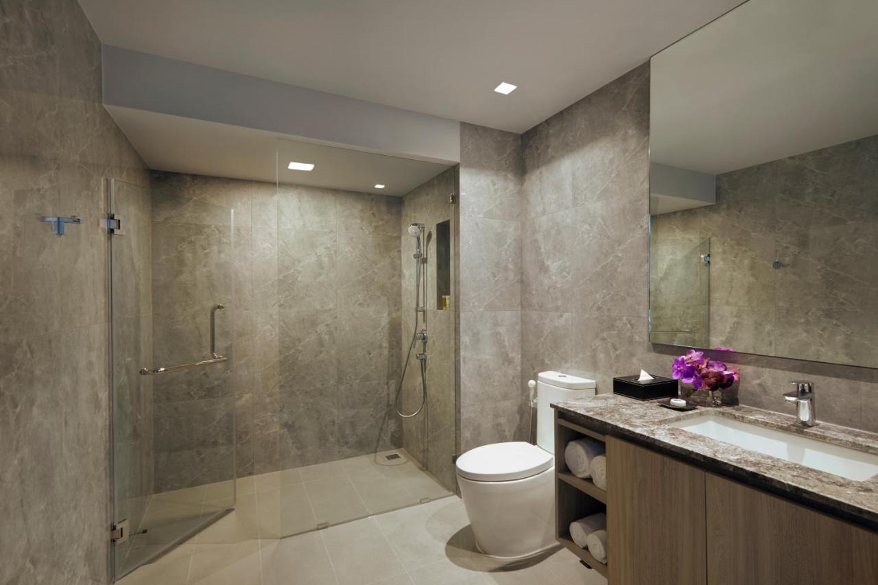 Somerset Rama 9 Bangkok - SHA Plus Certified Bagian luar foto A wet bathroom in Singapore